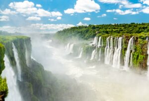 Iguazu Falls in a tropical rainforest. UNESCO world heritage in Brazil and Argentina SSUCv3H4sIAAAAAAAACoxX23KkNhB9T1X+wcVzpqI7KB+R7PtWHgRoxoq5FYjxerf239PACOsC9vrJ033olvq0Wkc/fv/t6Skr1WSq7K+nH8sv+G2aZp7sqKzpOzCjPx72UXe1Hn3LfaQC+QZdG9uPRjW+sVS2eu5Uq8HYzU2zmH+uzmyyys6Tnrzs1agh8123anzRFhzUxZmeZ2v1ONm+evHtqu5LnVhriNNO1qxpd+vQdzX3DddR68GE8RrVvvmGSnV3BQaSe5Y14fDc2z6AQuX69moHAla8r0UP/WTsip58uJ4G/2dpbsdhMaHjNdiH+WaVb+AIDd98w5t6a001rmG8ilfK6htQFNTcdcDX7feTczz2urCQ/Q1MjTp7hN8ImcvFkznTluLk+y/A5/TnP7Ot+378OMz2z787HzfdVQshe9Sdon3BYAtiXhUp8wrzC+JSXlhel5eyIPmFVYyJKyVXmes9ocsU95IfHSNesKMvYs5Ol/SlURVU/SBE0Kr+94QFEYIfvHgPtf3z06N51I1W28H6umXKXl7h8LQ+7a/QC+NVNY2fNhMUY5lFHJjbrL7PIY7zHMW4JdoUwjCTOIapETi1plMRVBYkhpaj+m6aBCdi3LqZEEYKnGSGuXbXYTiMBKPJTmw/j2ZqIyQVOI+R3XYygtSIIxrjRphq8QolLWJYo7p6qtQQRSRSJnse4EwFqAIxnqyv1Gq25jpHRRSIshj639zdmjAxQUiIJPNVtf0cEU2oSHJXCrZSR1vhBaEHRYTrZr04wpBJK9qxH0yVImmCvMFs7yIYzpO93I1+jdjDacuuLMdZj2ie+tk+x4vj9OhEVeGJKhiwfNz/RnWfH4FRme7ajzC/foHBudNTFQysjJGCCMwTrtOQMCNYEnGauy4YylkhJS7SdS4dvlzvv9A+TT/X8aFmyZGZKt3p8S0msUiKOb28JSOCnw2no5on42kadGWByEZFRxvBrDg4rwpoj9aApUw2bqF1o5XmRdKTg+r6UbXRFEVckKMKhVf8MgBQUslnPRoLF2449jCwCLdnDK6hLWCGP3RisAKc7F3Vd6hqOijRAUtz26azvNgX691zaq5N711p9x4mwyqxPNAwmsp0twX2sPQWNuqLzn7u7NpAMOPdNZs1fT+ocp2HcK9Nei+SmuCQd7Wze6k2/edl6nq73sKPyzur4Zpa09DldqIUjgijXBTQ+74kfjYQZ12QW+I8ND1M0jrQQZEkxgLlkkvQKieKxgEwO1EfDkCcdvU08+5zGjOQz7vXz/2QabtPvPtiCe0w1L0bEjXtAE6FHwhrh2HkHbNpbOfh/Fy6PTCk8DBOeT98XHqbdyIcfAVFSBbeyjz5jQUFrcSpIJvXyeRF+LYG+As5TR5Aj9SIeJU5In4ZOflHxAOA4VPuwCvkCevgy8VhScEj5SclBaWRFyclhVlBxSeECiRz9knnLJj8o6YWGJHipDVzSvyOcW+pjVcYfvkZ5ySXxSnnAtoFiwfn3oxYF29qX4lHdGaQkiEmqdwfACGdGZWSSMbgSkgfsjCvcw73Gkz3+NmbYcYk/HlDbuMSMgoKZwteFWeP0SUnAyVD3nM6JjN4bVQEYVAaGATt2bM3g0lHkIDJl509pLMCKkqBkR0RMAlaBvZcwO52vyMygxOYw8sOXRDm1wvDSlxKnfMLZwwamytSleX+laMYxj1ZlILI+e5zFGc5UAyC8X21HsEZg93m9CGhH8ya5SRnnORw1it5QaUqL/DelBfFCnSRgrGyphqjooSvfv4PAAD//wMAITVpJX4RAAA=